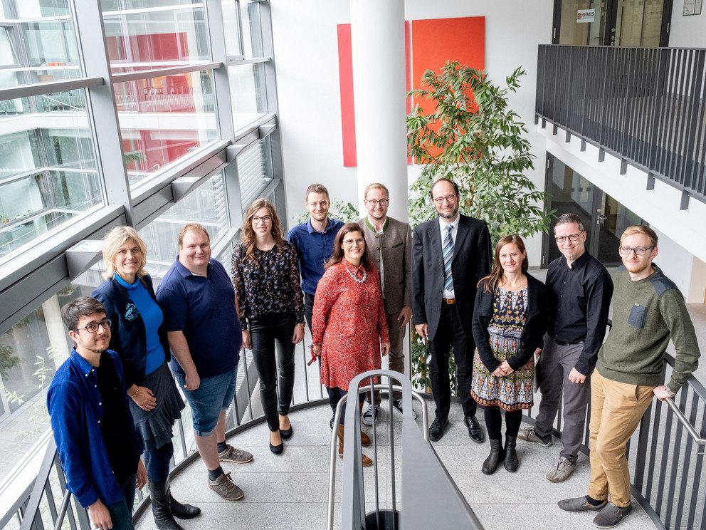 Computer science professor Harald Kosch and his young international team from the University of Passau. 